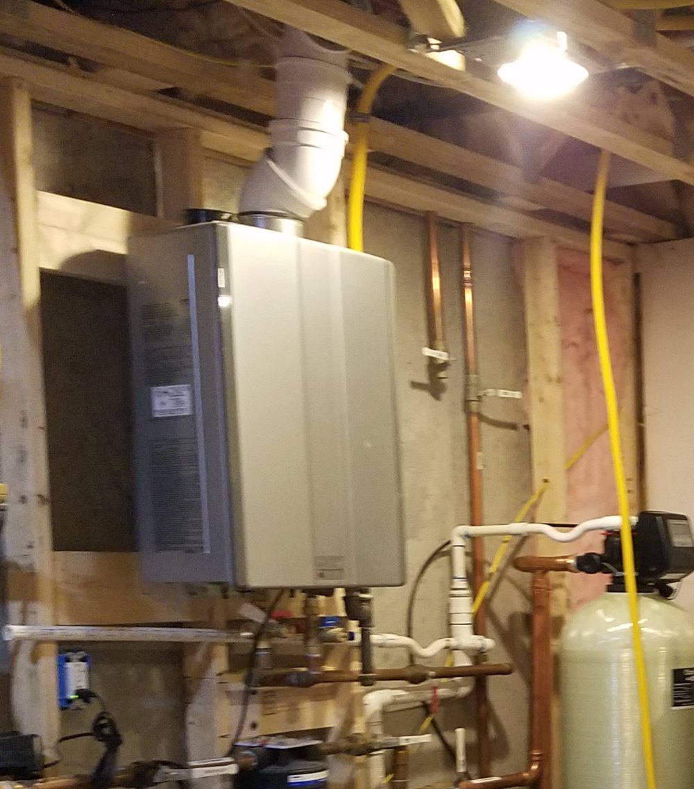 Water heater installed in a basement mechanical room